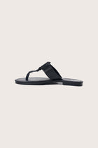 Side profile of the black leather Cate sandals highlighting the strap design