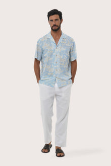 Front view of the Chalet Shirt in Coconut Island Light Blue print by By The Sea Bali