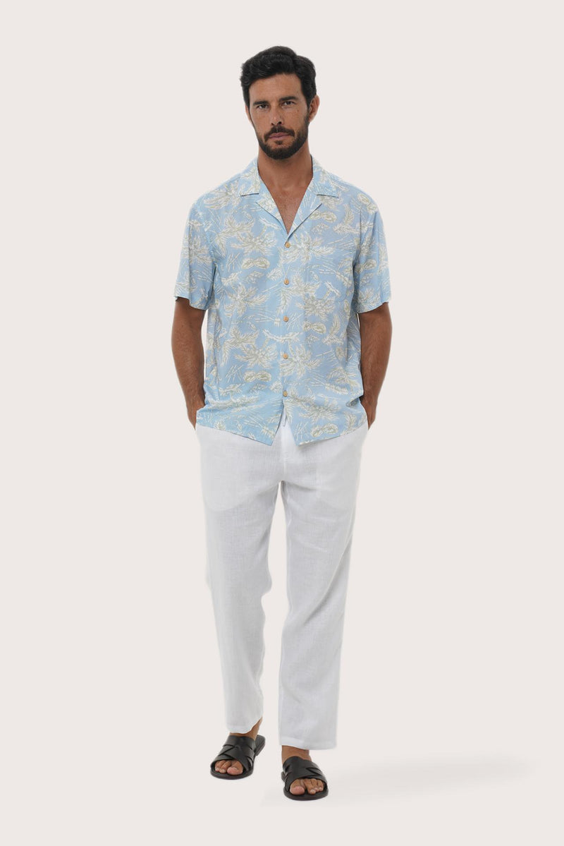 Front view of the Chalet Shirt in Coconut Island Light Blue print by By The Sea Bali