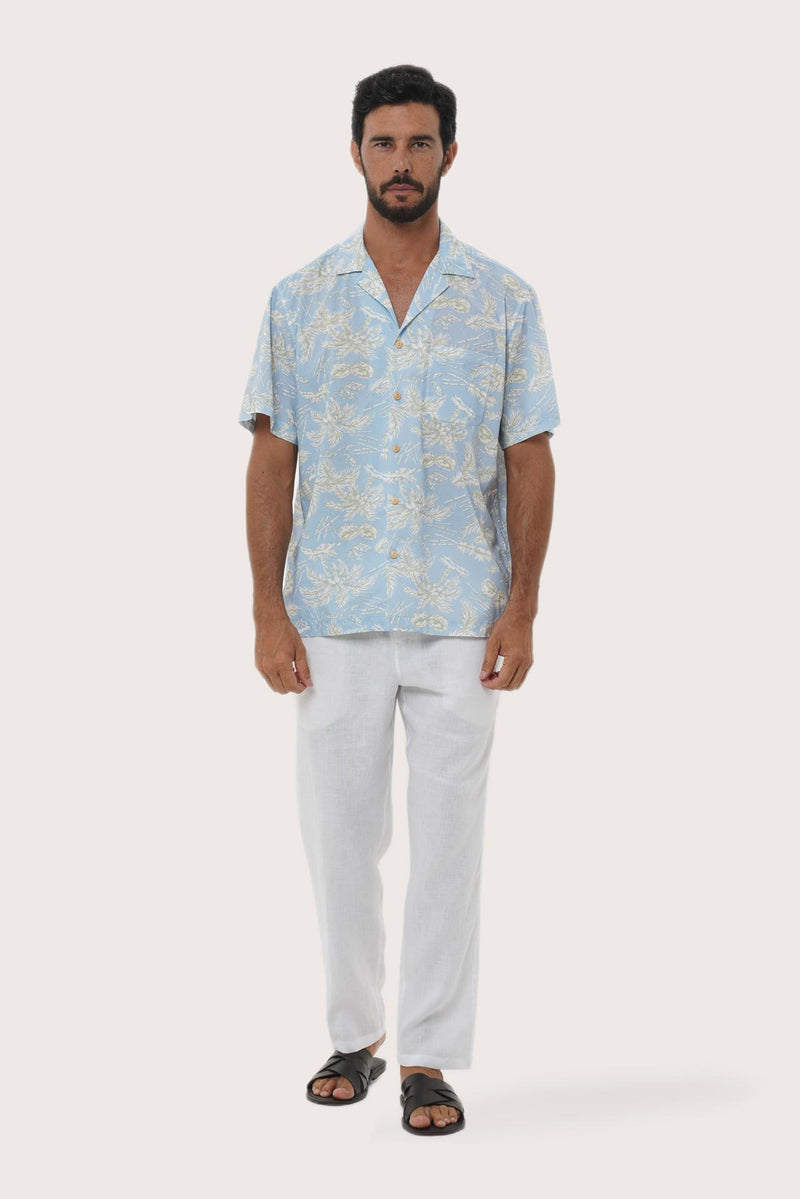 By The Sea Bali Chalet Shirt in Coconut Island Light Blue — relaxed camp-collar shirt in a tropical coconut print