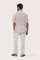 Side profile of the Chalet Coconut Island Light Pink Shirt showing its breathable, relaxed fit by By The Sea Bali