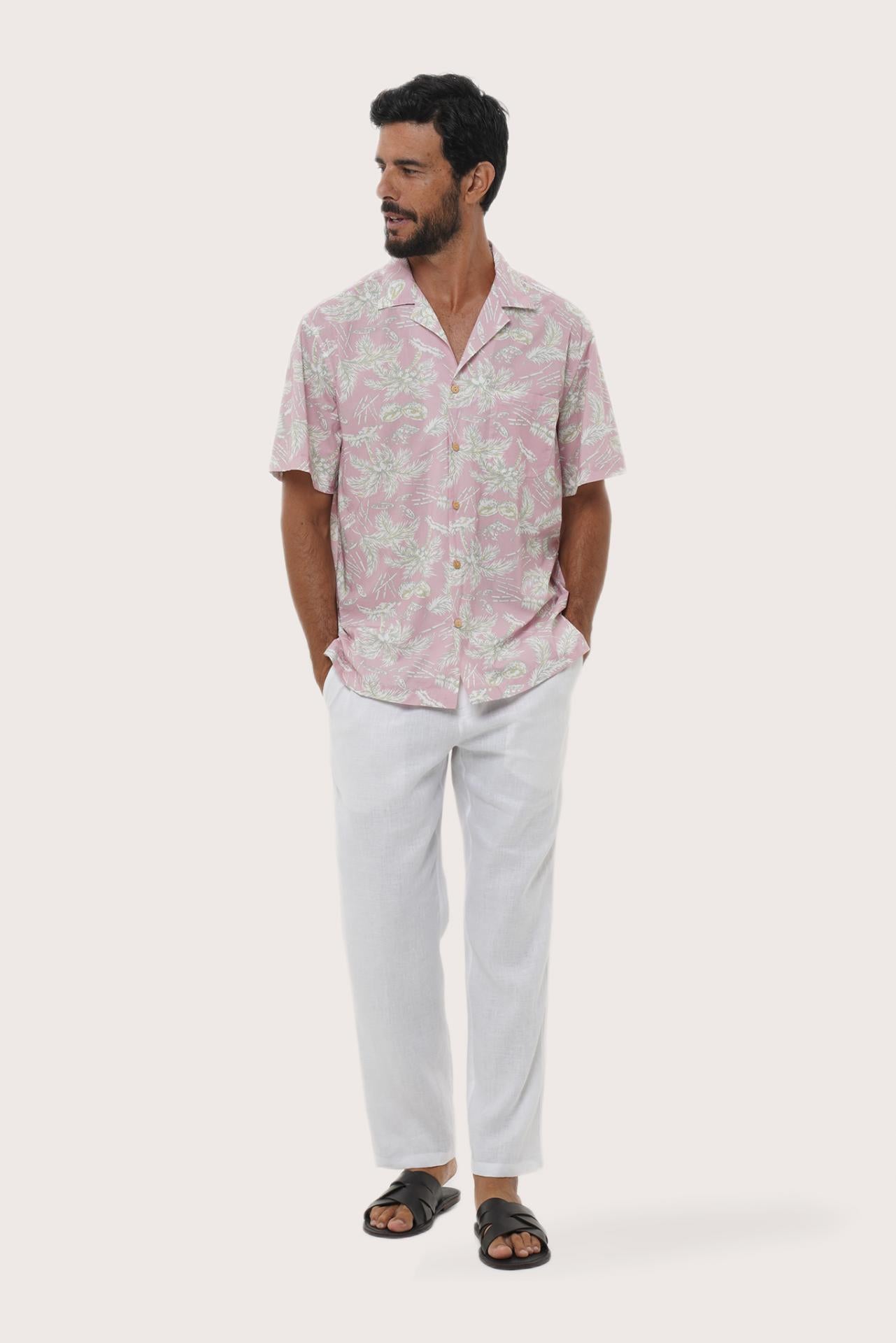 Front view of the Chalet Shirt in Coconut Island Light Pink print by By The Sea Bali