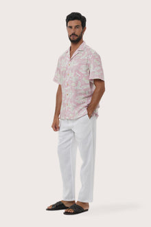 Close-up of the Coconut Island print on the Light Pink Chalet Shirt by By The Sea Bali