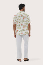Back view of the Chalet Shirt Island Rhythm in White showcasing its tailored finish by By The Sea Bali