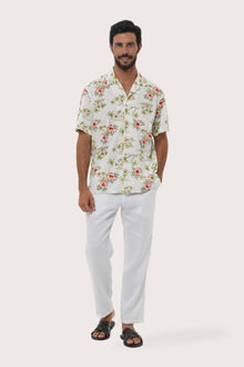 Front view of the Chalet Shirt Island Rhythm in White by By The Sea Bali, styled for effortless summer dressing