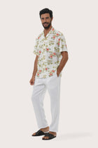 Side profile of the Chalet Shirt Island Rhythm in White highlighting its easy, breathable fit by By The Sea Bali