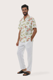 Side profile of the Chalet Shirt Island Rhythm in White highlighting its easy, breathable fit by By The Sea Bali