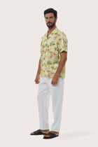 Side profile of the Chalet Shirt Island Rhythm in Yellow highlighting its easy, breathable fit by By The Sea Bali