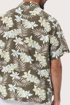 Open camp collar and button-front detail of the Chalet Shirt in Monstrea Army by By The Sea Bali
