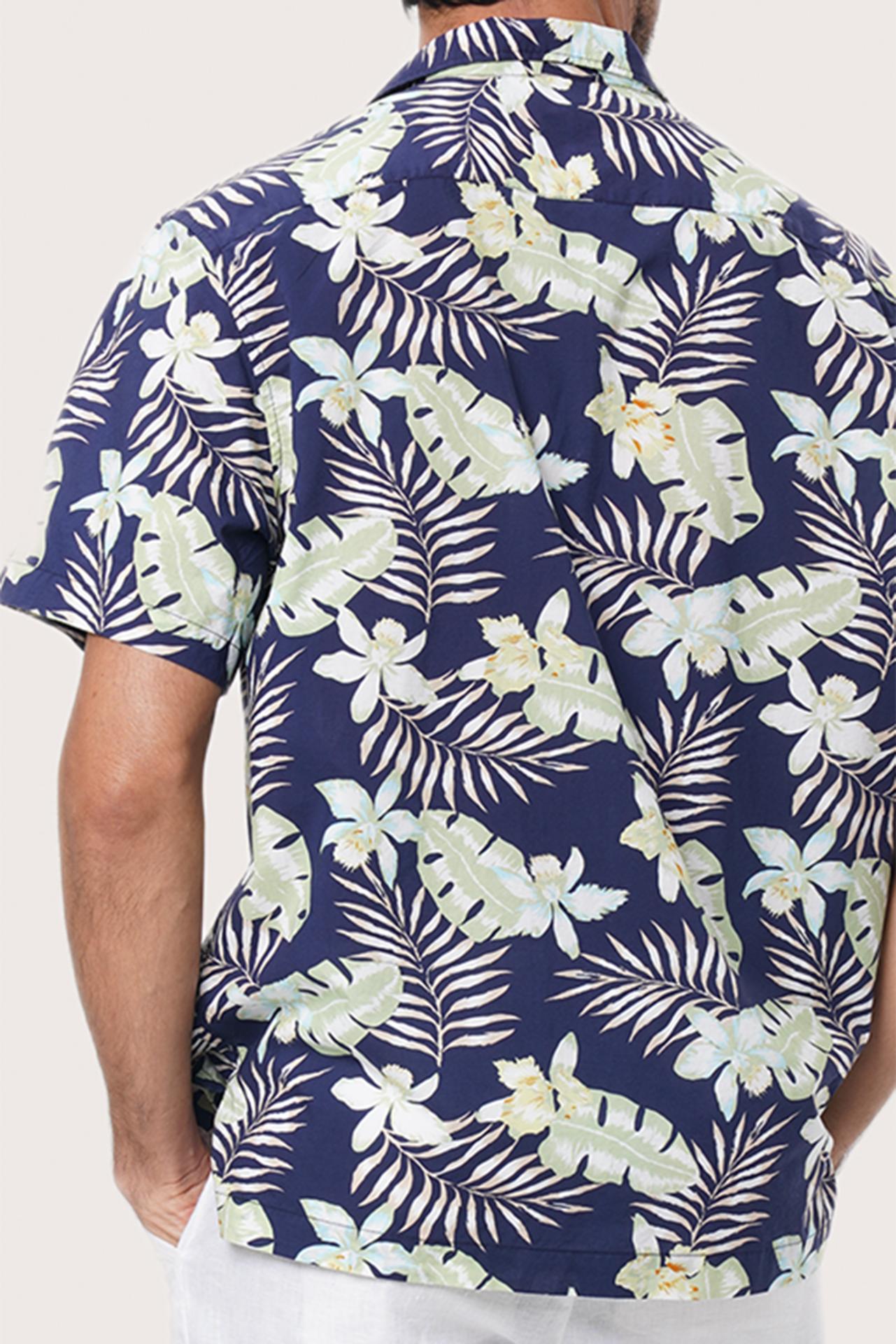 Men's tropical styling featuring the Chalet Shirt in Monstrea Blue by By The Sea Bali