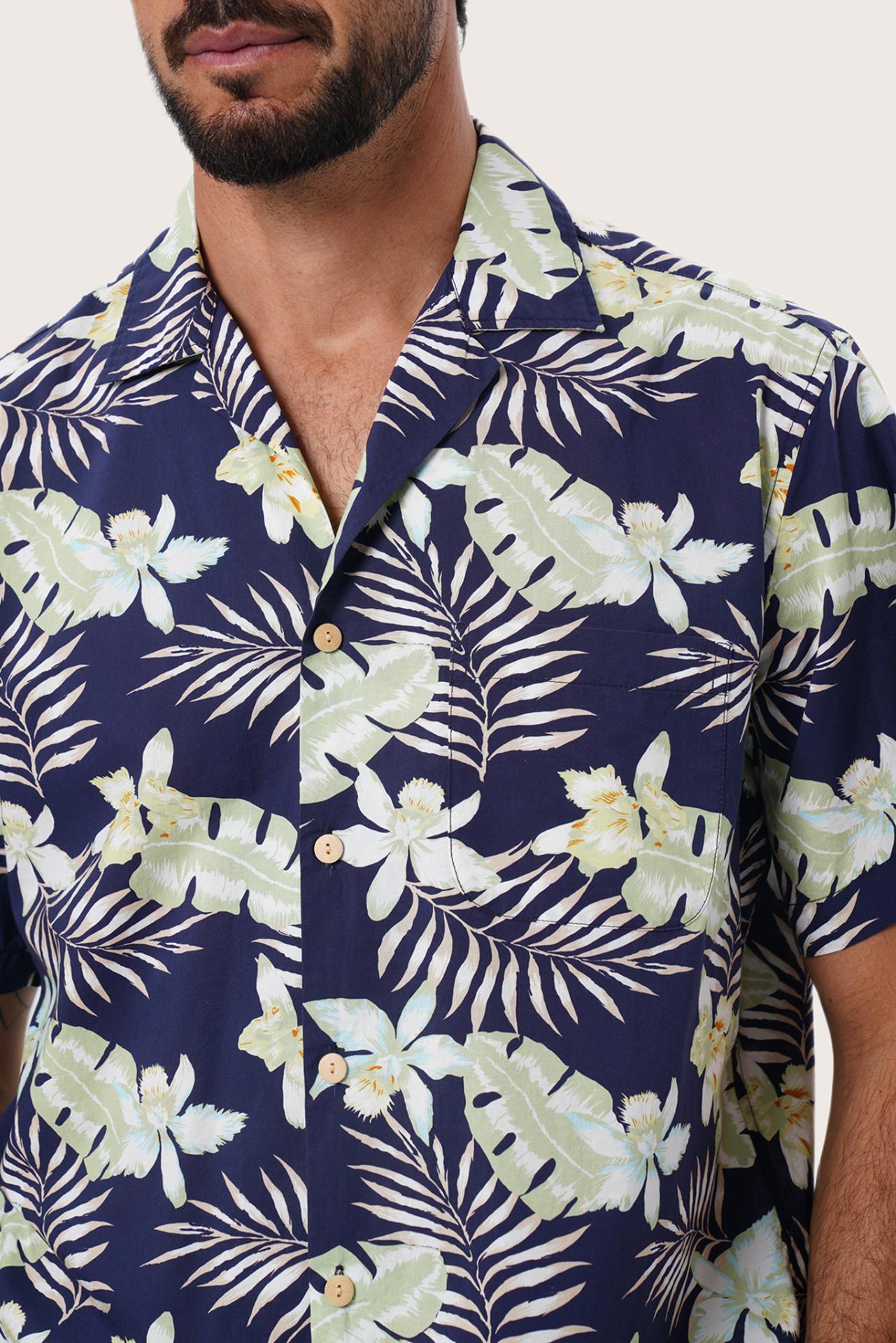 Open camp collar and button-front detail of the Chalet Shirt in Monstrea Blue by By The Sea Bali