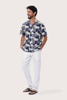 Close-up of the Monstrea Blue monstera-leaf print on the Chalet Shirt by By The Sea Bali