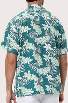 Open camp collar and button-front detail of the Chalet Shirt in Monstrea Green by By The Sea Bali