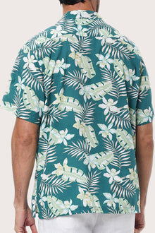 Open camp collar and button-front detail of the Chalet Shirt in Monstrea Green by By The Sea Bali