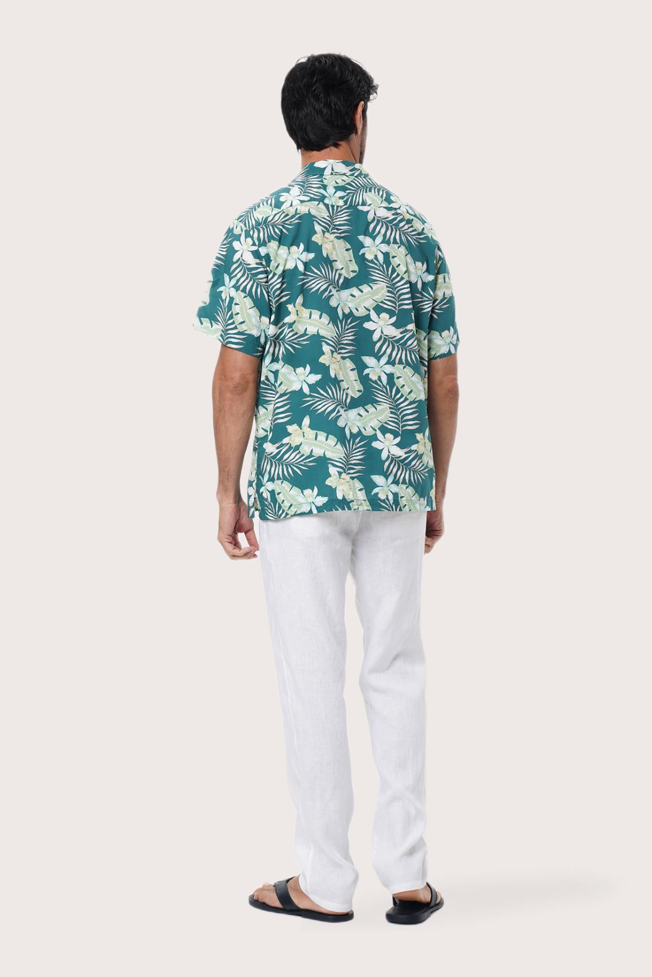 Close-up of the Monstrea Green monstera-leaf print on the Chalet Shirt by By The Sea Bali