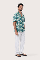 Front view of the Chalet Shirt in Monstrea Green print by By The Sea Bali, an easy resortwear staple