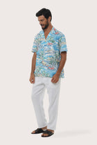Front view of the Chalet Shirt in Tropical Day Blue print by By The Sea Bali, an easy resortwear staple