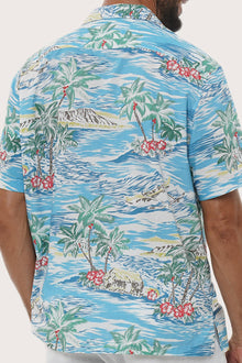 Open camp collar and button-front detail of the Chalet Shirt in Tropical Day Blue by By The Sea Bali