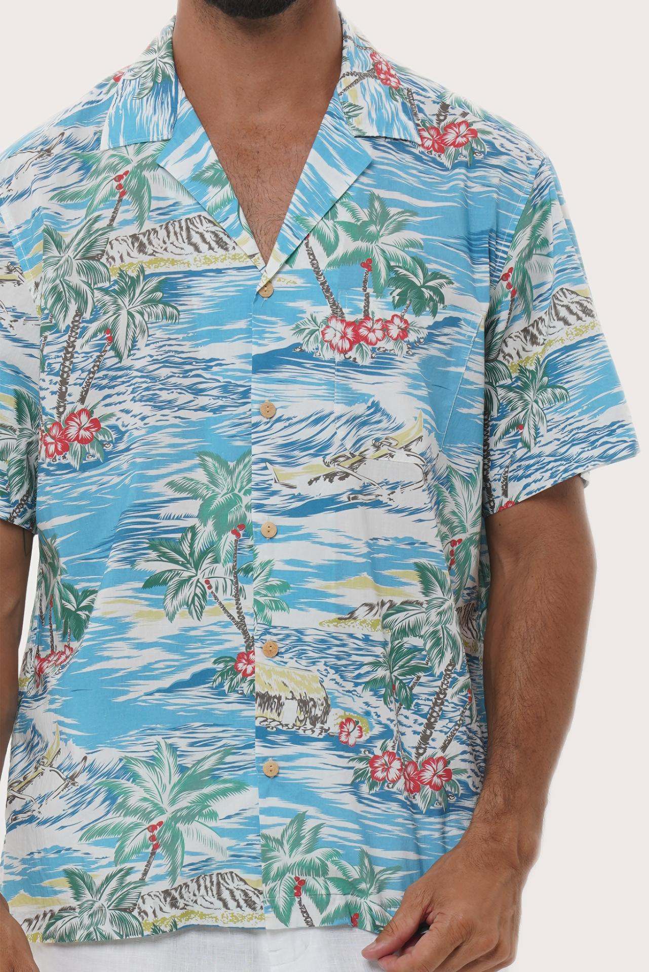 Side profile of the Chalet Tropical Day Blue Shirt showing its breathable, relaxed fit by By The Sea Bali