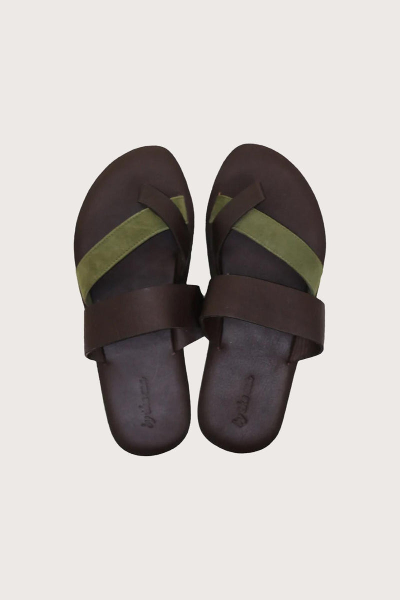 Coal sandal in brun shown in a global view highlighting its full silhouette and refined resort design