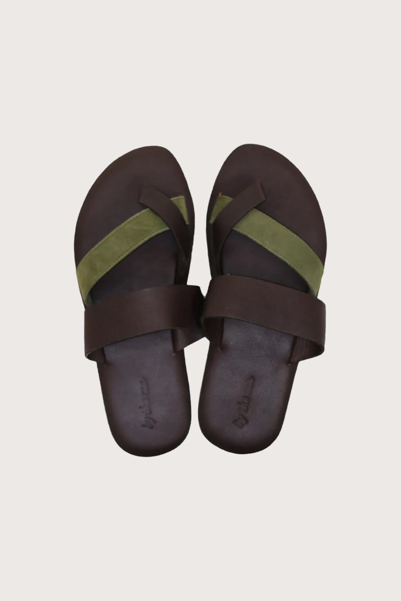 Coal sandal in brun shown in a global view highlighting its full silhouette and refined resort design