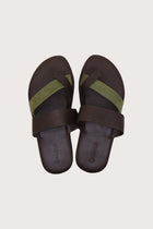 Coal sandal in brun shown in a global view highlighting its full silhouette and refined resort design