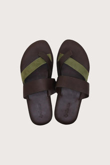 Coal sandal in brun shown in a global view highlighting its full silhouette and refined resort design