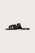 Side profile of Coal sandal in brun highlighting sleek and modern resort footwear silhouette