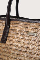 Close-up detail of the Cora Bag highlighting premium materials and refined finishing