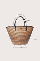 Full view of the Cora Bag capturing its spacious design and timeless vacation appeal