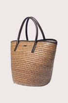 Side view of the Cora Bag highlighting its structured shape and versatile design