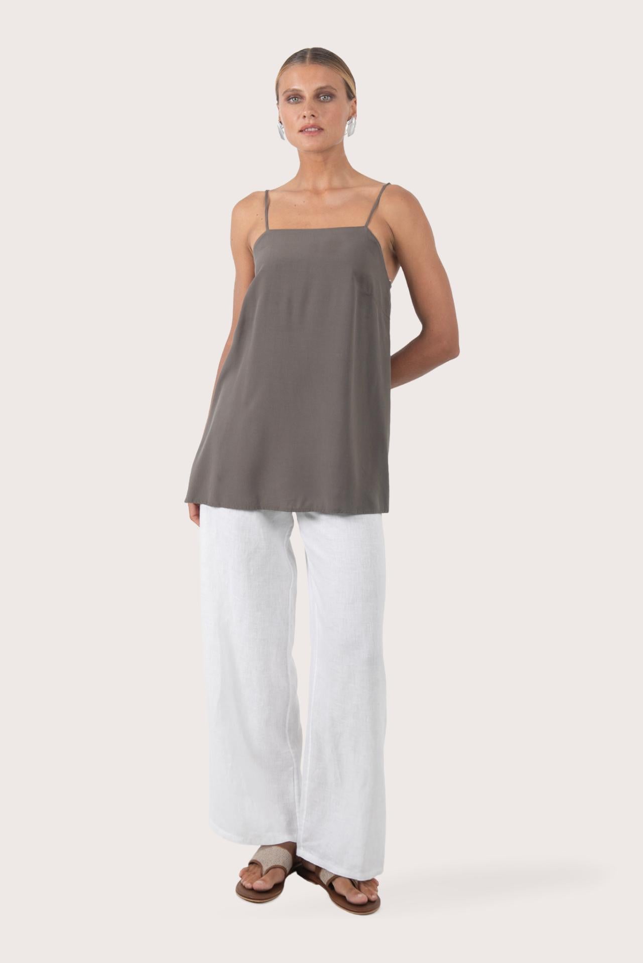 Women's grey rayon top featuring a relaxed modern silhouette with soft lightweight fabric for effortless resort wear and tropical summer styling by By The Sea Bali