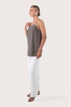 Side profile showing the relaxed cut and breathable lightweight rayon construction