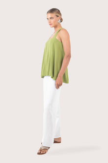 Side profile showing the flattering relaxed fit and rayon construction