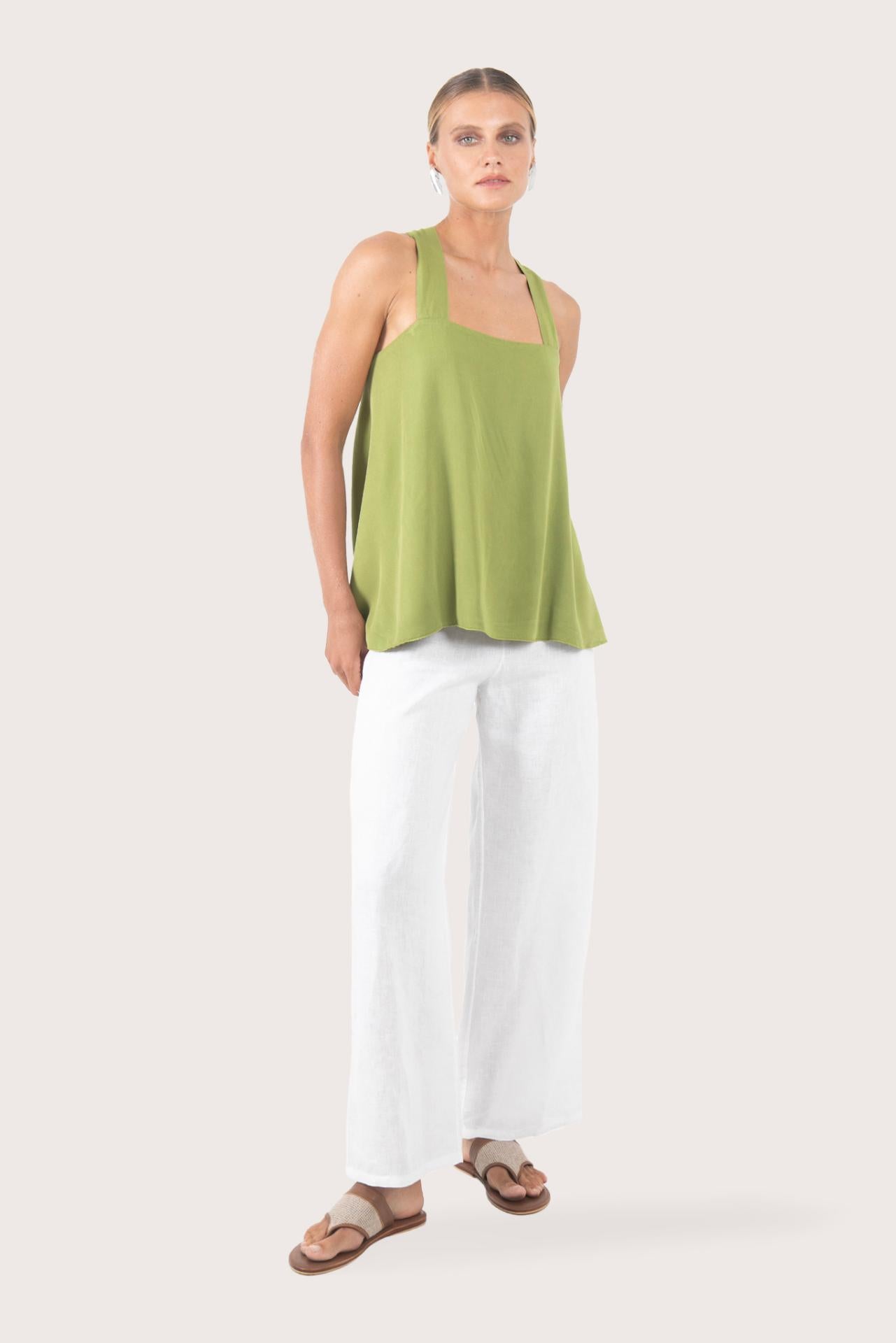 Front view of the sage green rayon top showcasing the relaxed silhouette, clean neckline and modern design