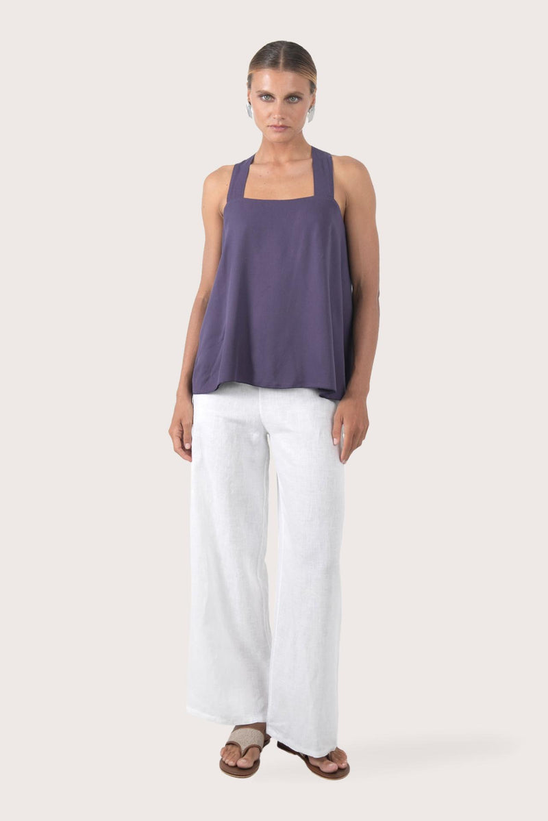 Women's purple rayon top featuring an elegant open-back design with breathable lightweight fabric for effortless resort wear and tropical summer styling by By The Sea Bali.