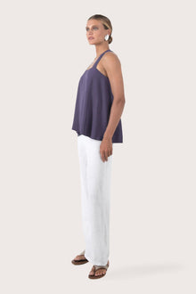 Side profile showing the flattering loose fit and breathable rayon construction