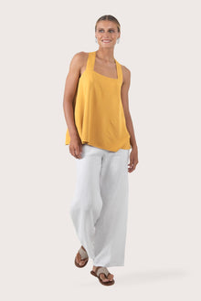 Front view of the yellow rayon top showcasing the relaxed silhouette, clean neckline and airy fit