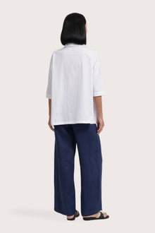 Back view of the Daria Cotton Shirt White highlighting the garment shape and drape.