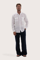 Model wearing the white linen Darren shirt by By The Sea Bali