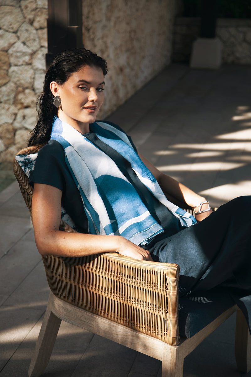 Woman wearing the Darya Linen Top Navy Blue designed for effortless resortwear and tropical living by By The Sea Bali.