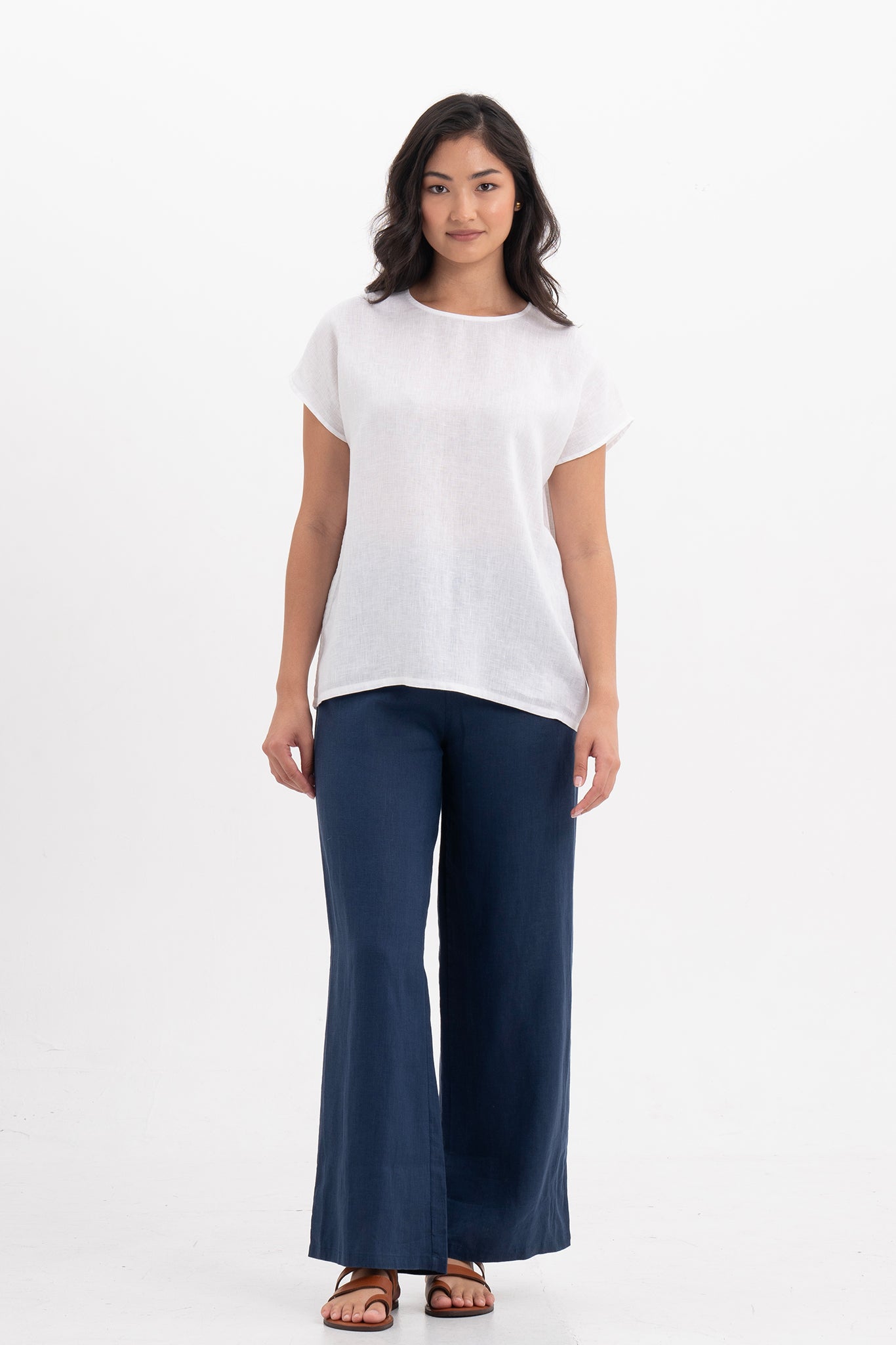 Front view of the Darya Linen Top White showcasing its silhouette and relaxed fit.