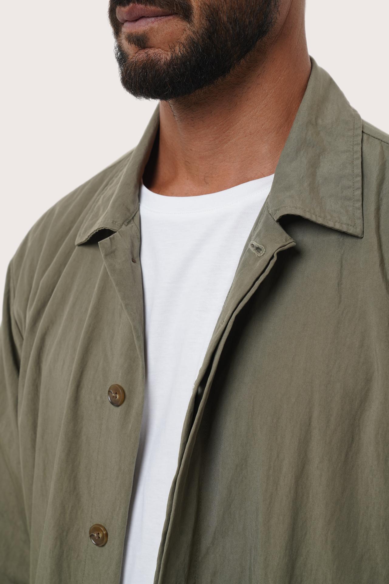 Side profile of the Dero Jacket in Grey Brown highlighting the relaxed fit by By The Sea Bali