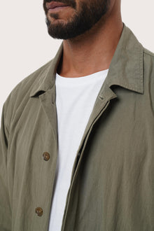 Side profile of the Dero Jacket in Grey Brown highlighting the relaxed fit by By The Sea Bali
