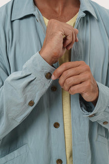 Side profile of the Dero Jacket in Light Blue highlighting the relaxed fit by By The Sea Bali