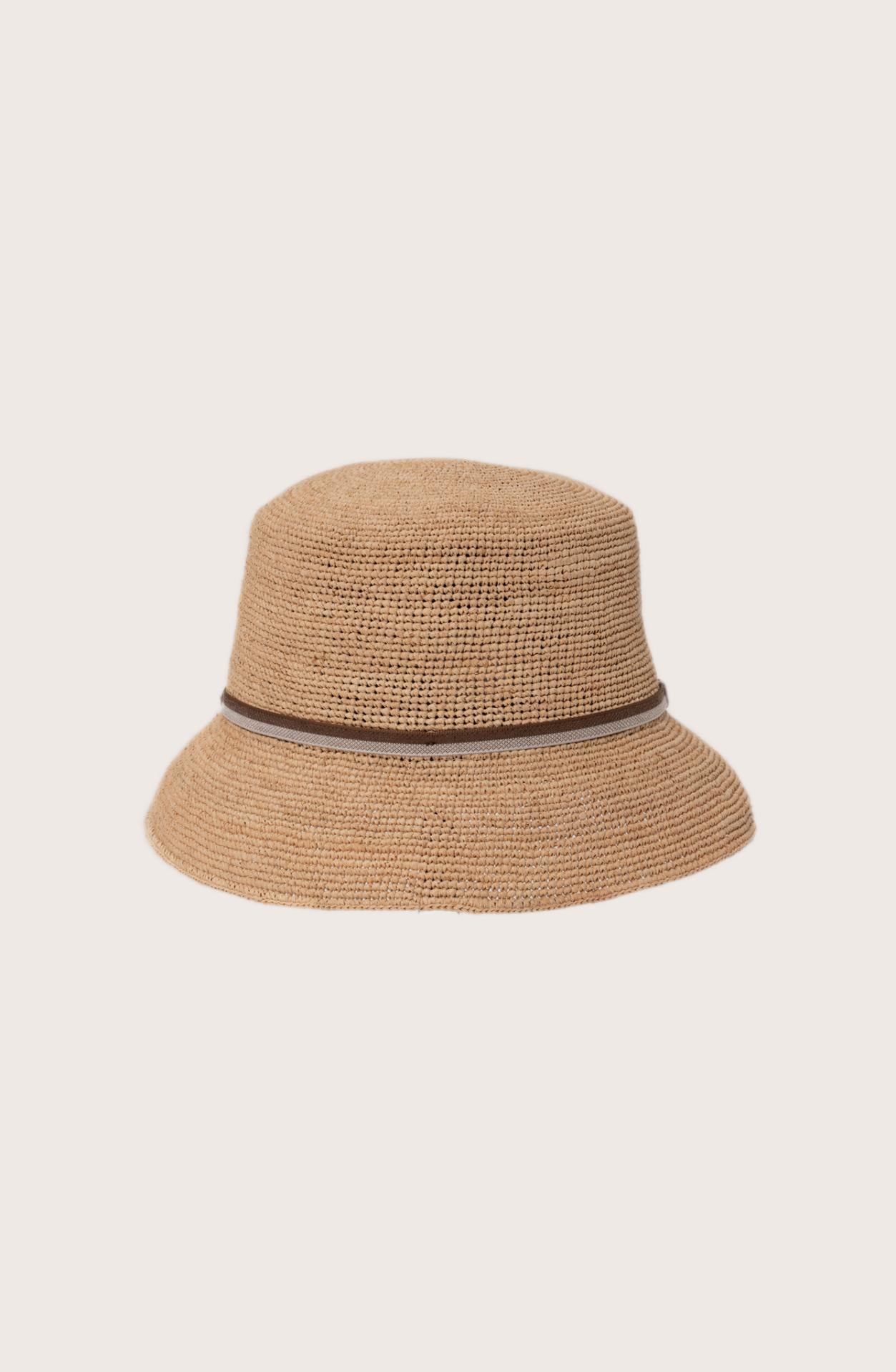 Back view of the natural straw Dewy hat featuring an elegant brown ribbon