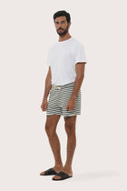 Front view of the Esco Bermuda Shorts in Stripe Green by By The Sea Bali