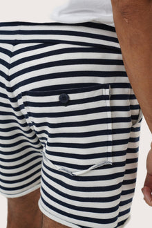 Men's resortwear styling featuring the Esco Bermuda Shorts in Stripe Navy by By The Sea Bali