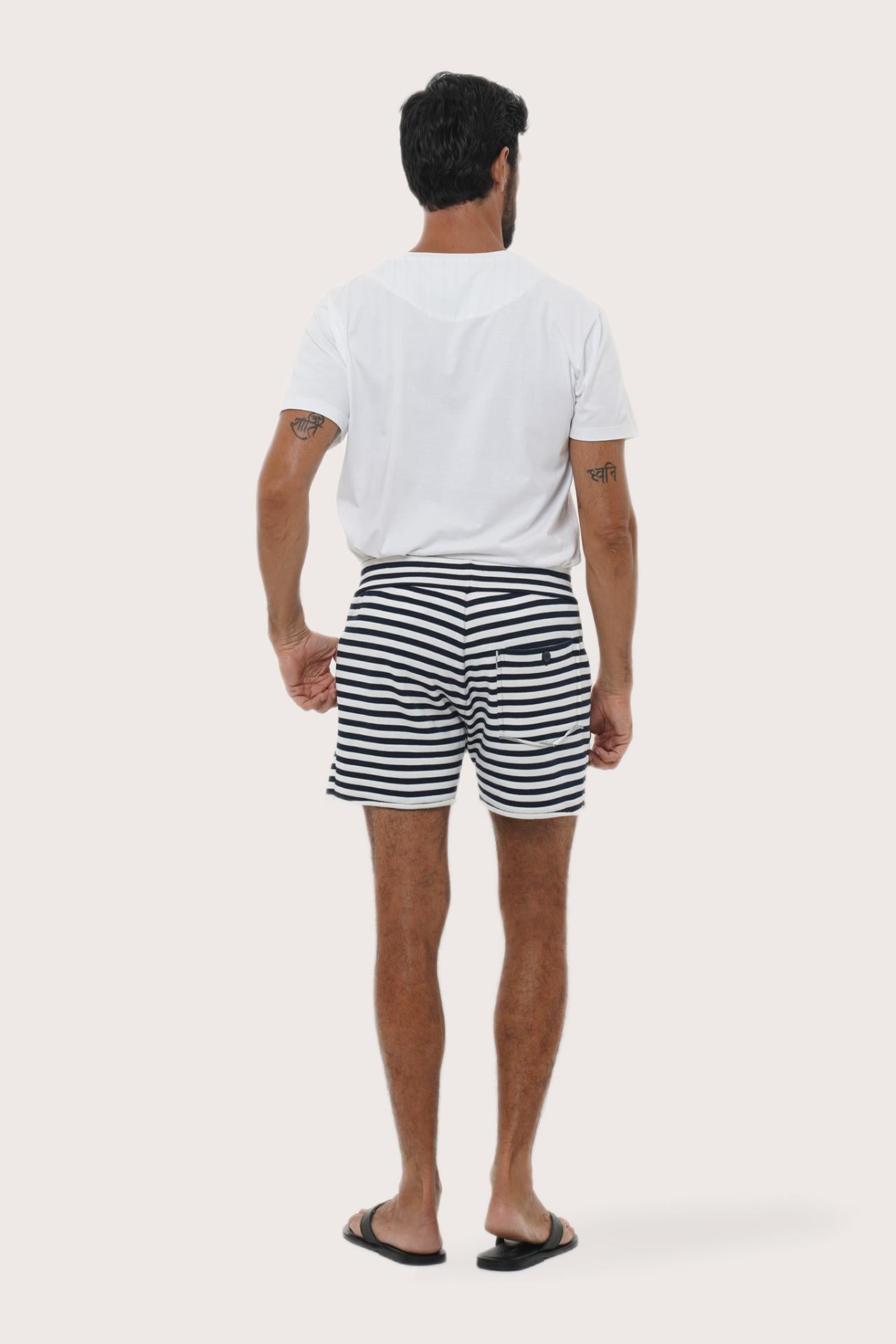 Side view of the Esco Bermuda Shorts in Stripe Navy with waistband and pocket detail by By The Sea Bali