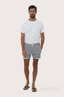 Close-up of the navy stripe pattern on the Esco Bermuda Shorts by By The Sea Bali